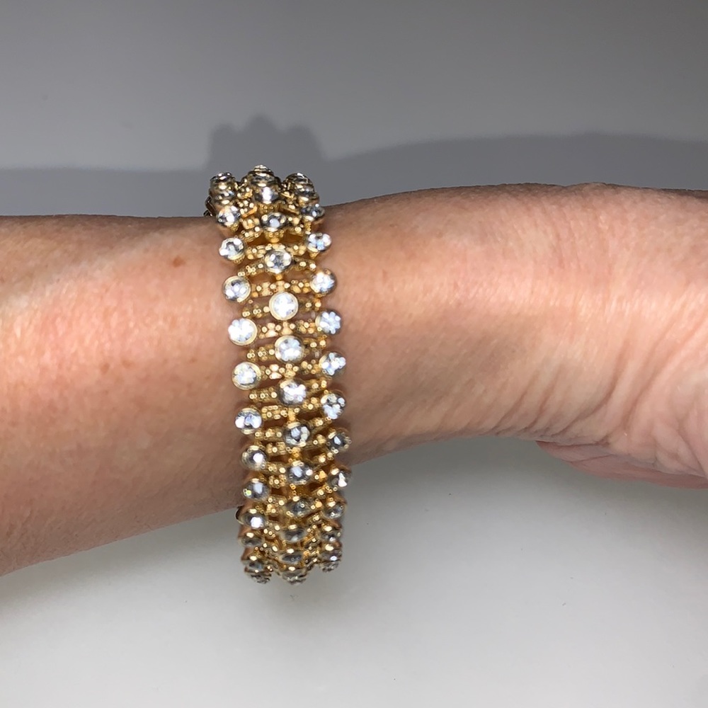 Pretty and sparkly 3 row rhinestone stretch bracelet in a gold metal setting